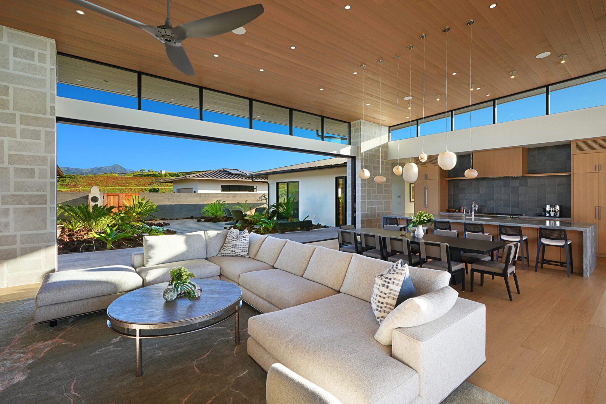 A living room with couches and tables in it