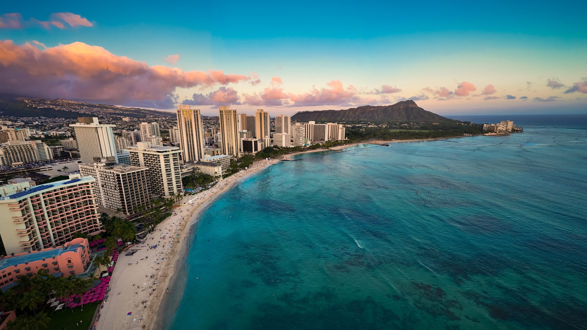 Waikiki Beach Honolulu Hawaii Aerial View Skyline Diamond Head A view of the ocean and buildings in honolulu.
