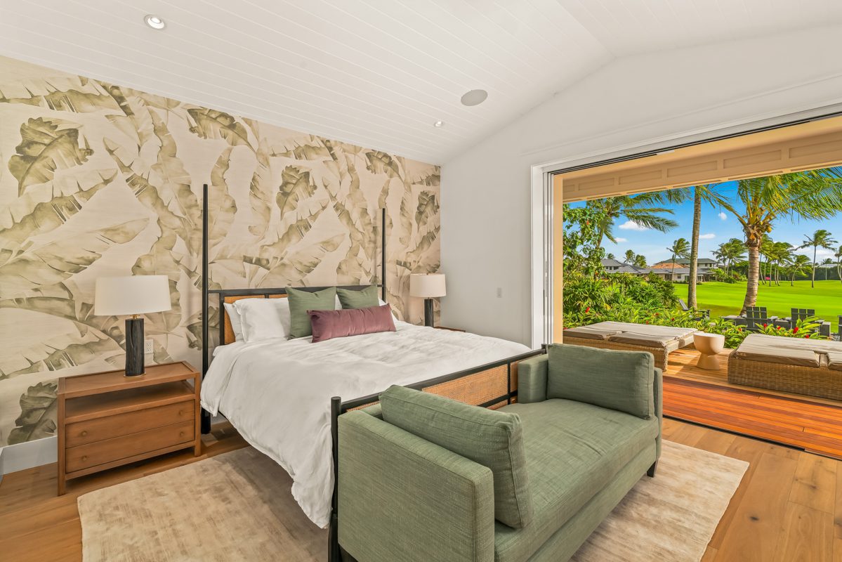 A bedroom with a couch and bed in it