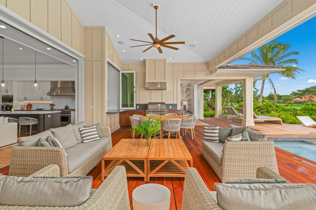 A living room with couches and tables in it