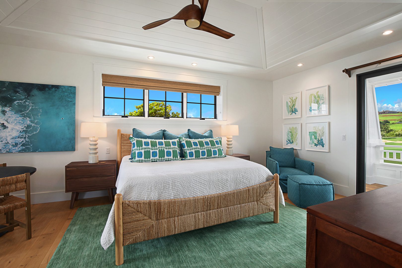 A bedroom with a bed, chair and window.